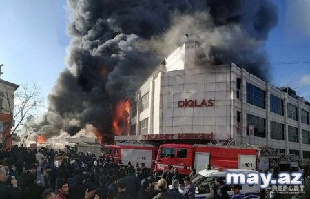 Bakıda ticarət mərkəzində başlayan yanğının söndürülməsinə helikopter cəlb olunub - FOTO - VİDEO